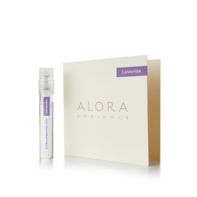 Small clear plastic vial that says “Alora Ambiance” and “Lavanda” next to a tan card that also says “Alora Ambiance" and “Lavanda”