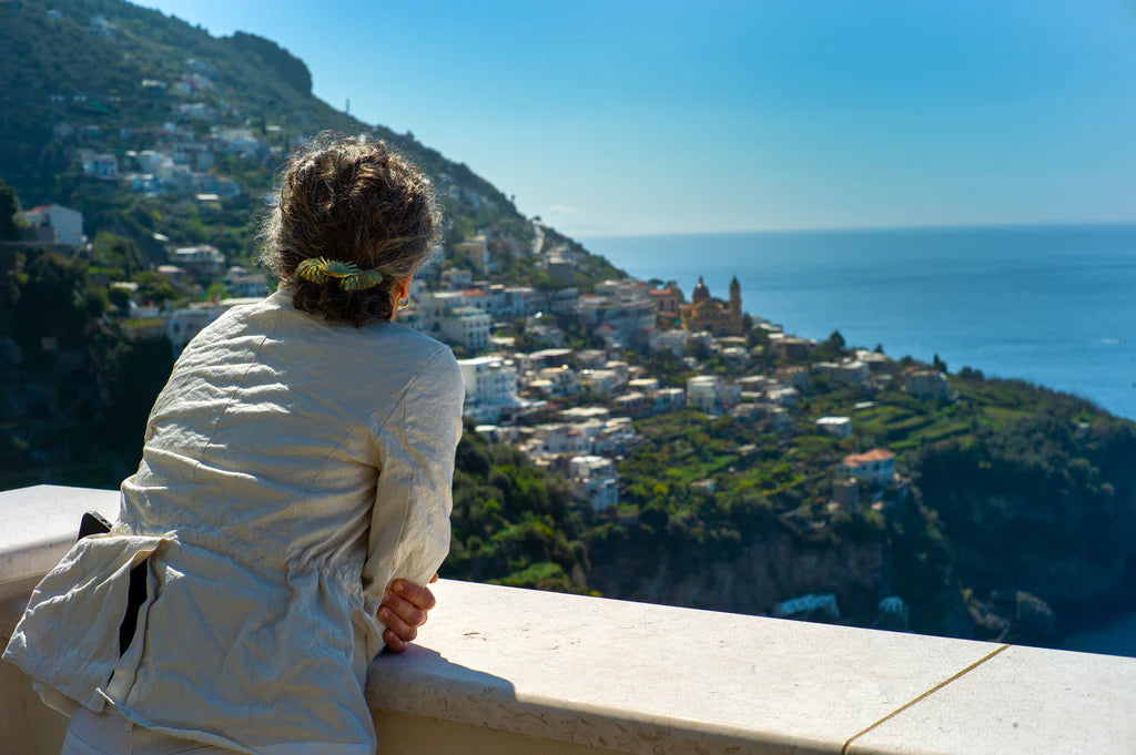 Woman looking out over views of the Amalfi Coast