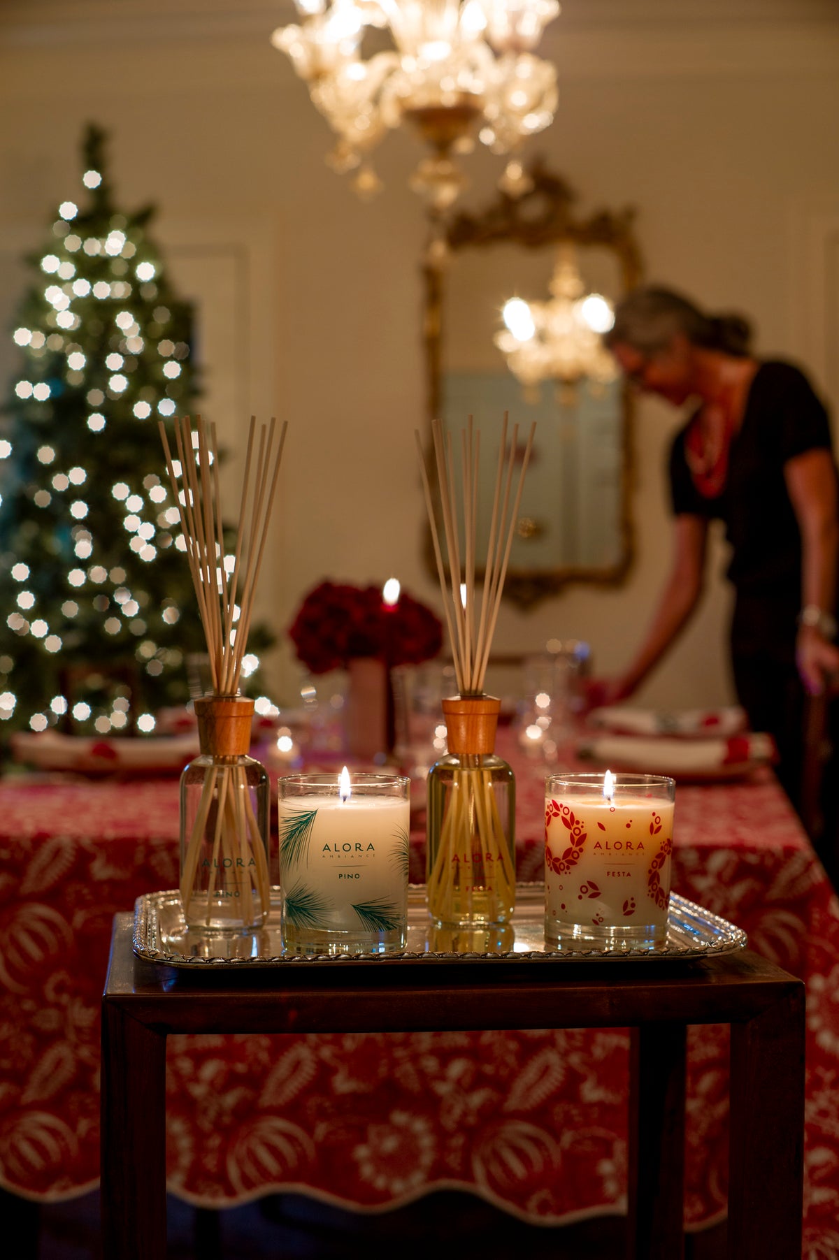 home fragrance display featuring holiday scented reed diffusers