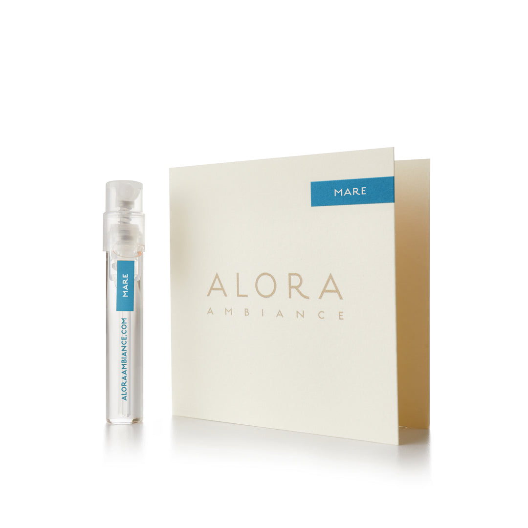 1.5oz Mare vial next to "Alora Ambiance" fragrance sample card